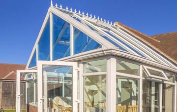 conservatory roof insulation costs Clapton Park