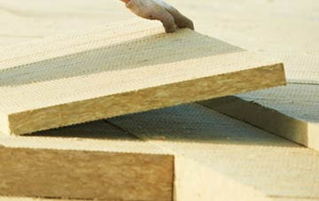 measuring Clapton Park tapered insulation